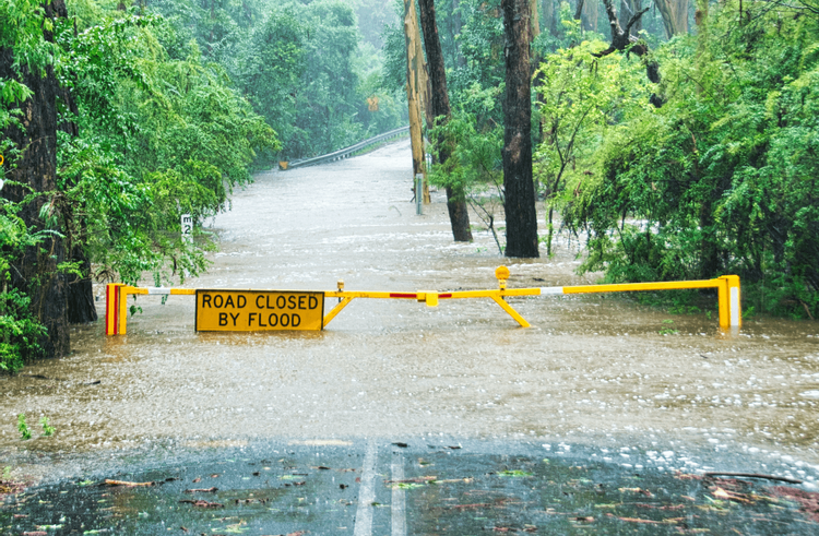 Image of a road that is closed due to a flood