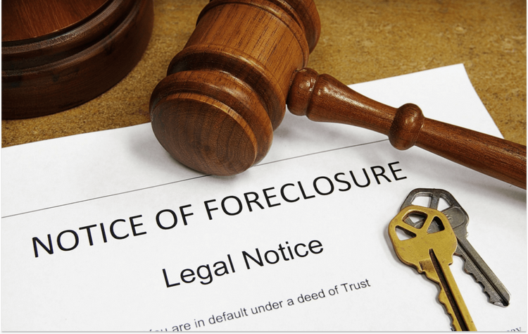 Image of a gavel and a set of house keys resting on top of a piece of paper that has the words "Notice of Foreclosure"