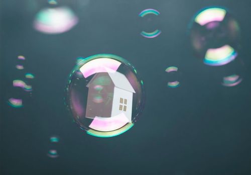 Image of a house inside of a bubble
