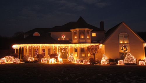 Image depicting a house decorated with Christmas lights